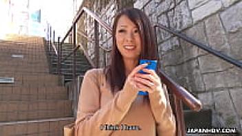Asuka, a Japanese housewife, is publicly gratifying a man.