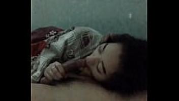 A girl blowing a trumpet