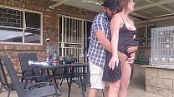 While he is at work, his neighbor's wife is outside upskirting.