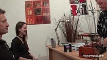 A slim French brunette in stockings is shown on an amateur anal casting couch.
