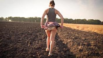 Observing a Schoolgirl Strolling Outside in Upskirt Full-Back Panties