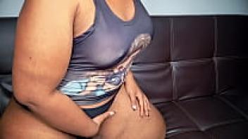 This evening, Ebony Milf, who wears spectacles and has red hair, is extremely aroused.